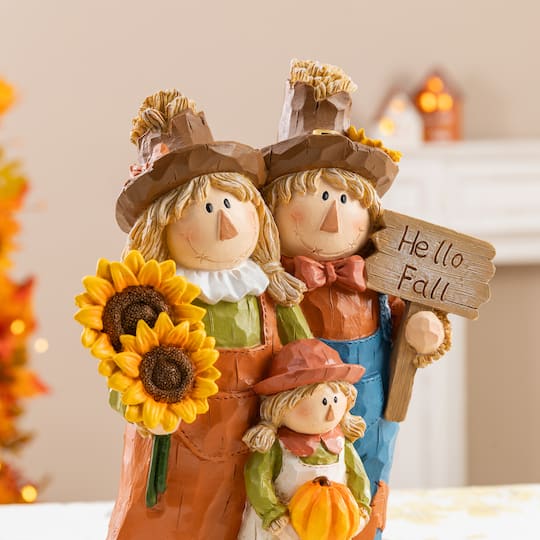 Glitzhome® 10.5" Fall Resin Scarecrow Family Table Decor